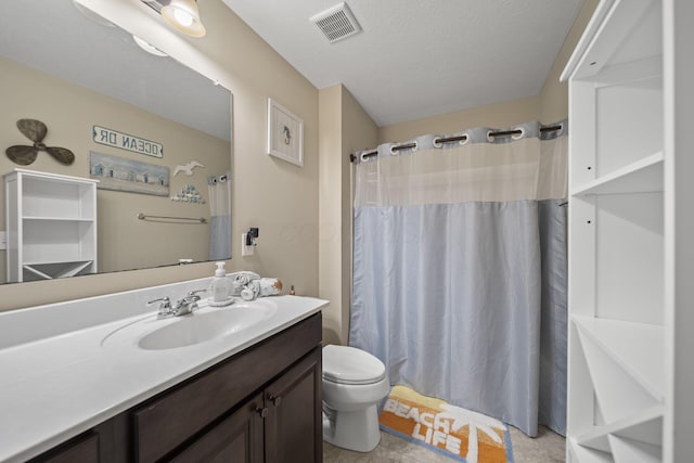 bathroom with a textured ceiling, toilet, vanity, visible vents, and a shower with curtain