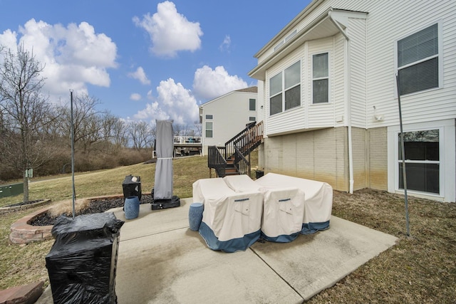 view of patio / terrace featuring stairway