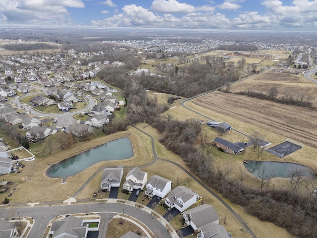 aerial view with a water view and a residential view