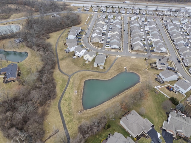 aerial view with a water view and a residential view