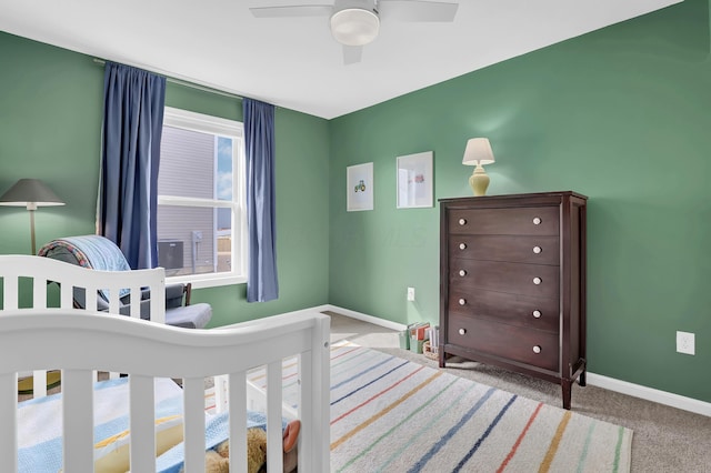 bedroom featuring carpet floors, ceiling fan, and baseboards