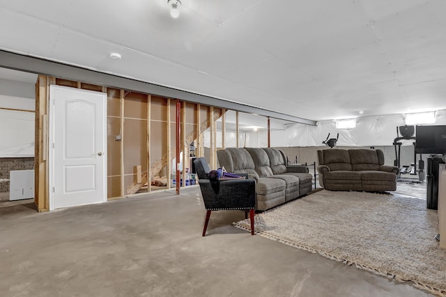 living room featuring concrete floors