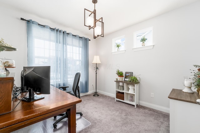 carpeted office with a notable chandelier and baseboards