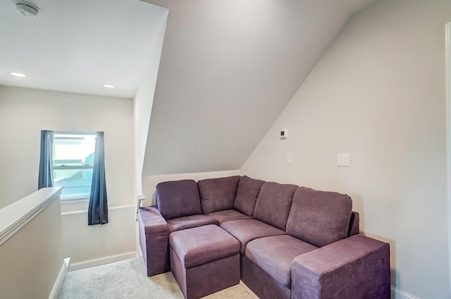 living room featuring carpet, baseboards, and recessed lighting