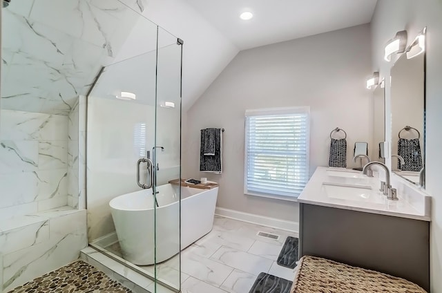 full bath featuring marble finish floor, lofted ceiling, a shower with shower door, a freestanding tub, and baseboards