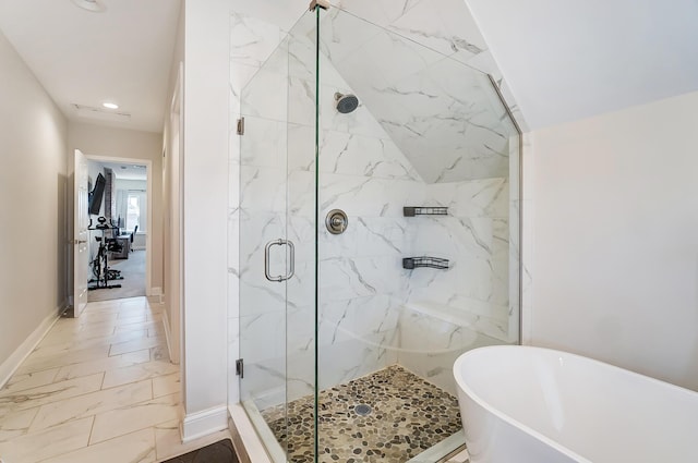 full bath with a marble finish shower, baseboards, marble finish floor, a freestanding tub, and recessed lighting