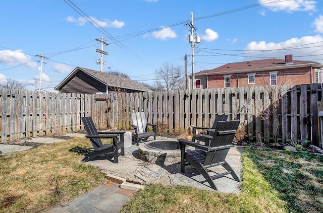 view of yard with a patio, an outdoor fire pit, and fence private yard