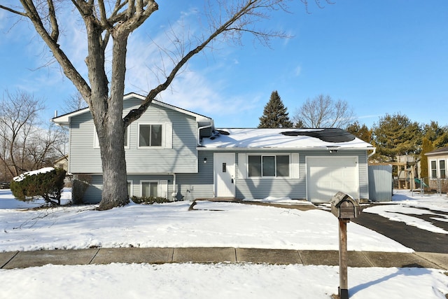 tri-level home with a garage