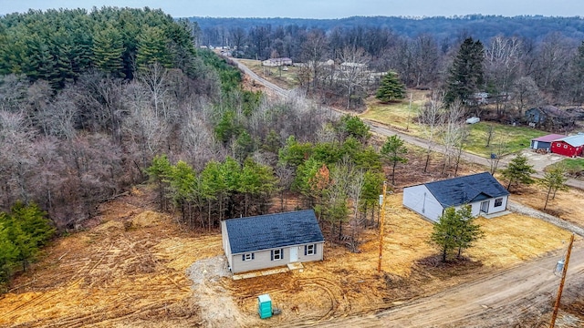 bird's eye view featuring a view of trees