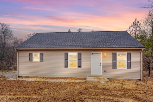 view of front of house featuring a shingled roof