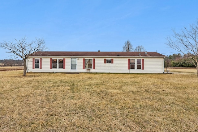 view of front of home with a front yard