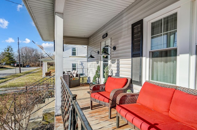 view of patio / terrace with outdoor lounge area and a porch