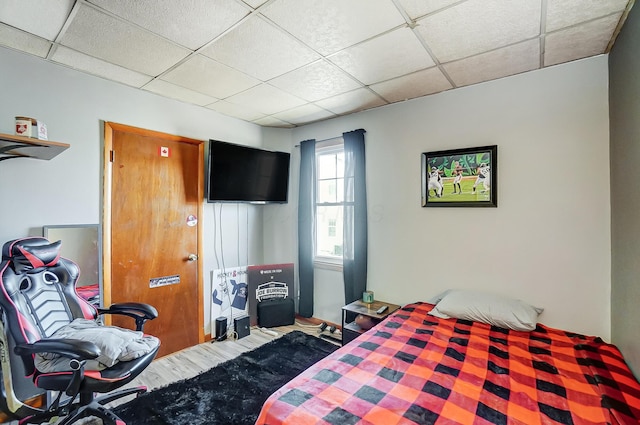 bedroom with a drop ceiling