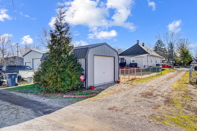 detached garage with fence