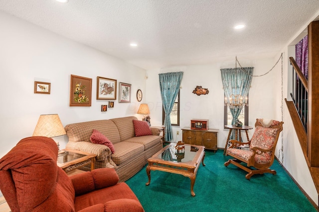 living area with carpet floors, a chandelier, a textured ceiling, and recessed lighting