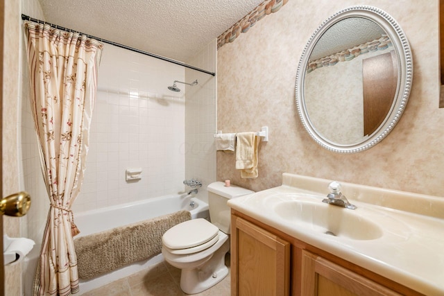 full bathroom with toilet, shower / bath combo with shower curtain, vanity, a textured ceiling, and tile patterned flooring