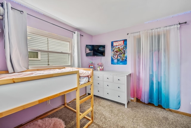bedroom with light colored carpet
