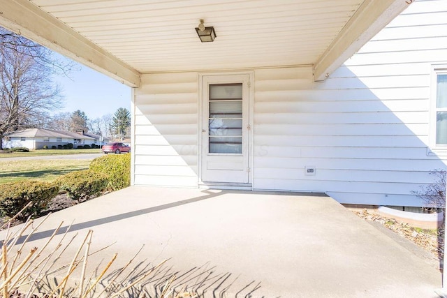 doorway to property featuring a patio