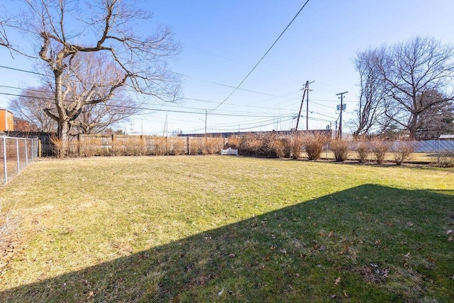 view of yard featuring fence