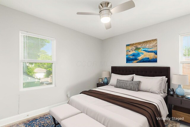 983 Seymour Ave, Columbus, OH 43206 - bedroom featuring baseboards and a ceiling fan