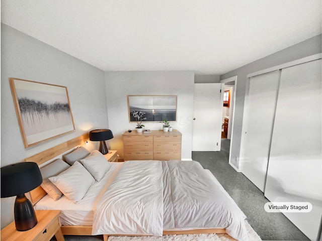 bedroom featuring carpet and a closet