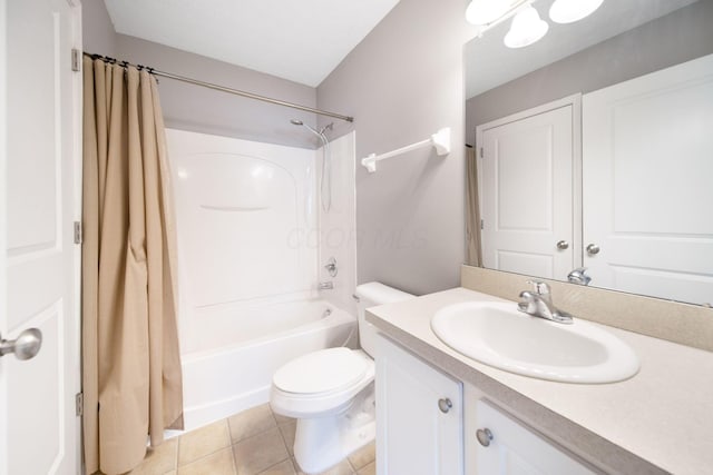 full bathroom with shower / bath combination with curtain, tile patterned flooring, vanity, and toilet