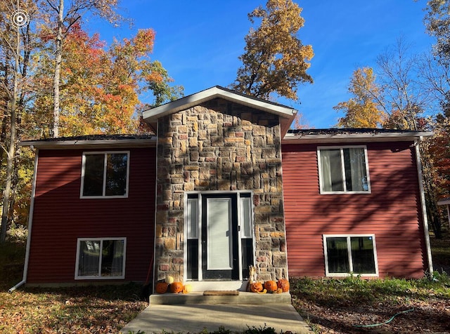 view of front of house with stone siding