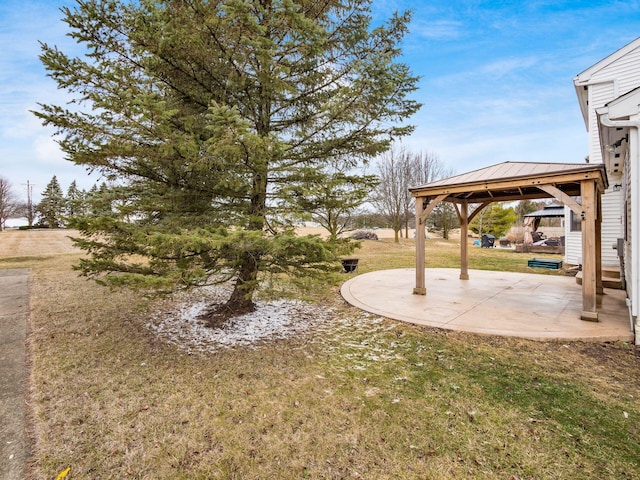 view of yard featuring a gazebo and a patio area