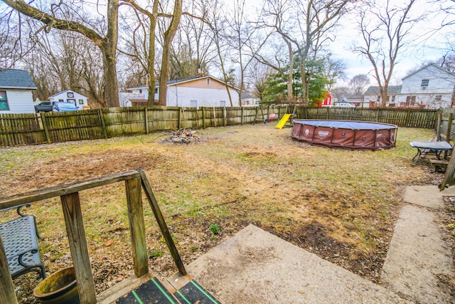 view of yard with a fenced backyard