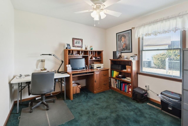 home office with dark carpet, baseboards, and ceiling fan