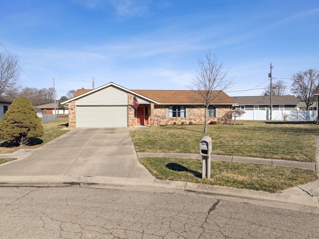 view of front of property with an attached garage, fence, a front lawn, and concrete driveway