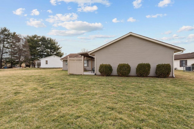 view of home's exterior featuring a yard