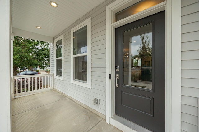 doorway to property featuring a porch