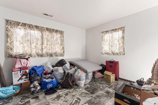 bedroom featuring visible vents