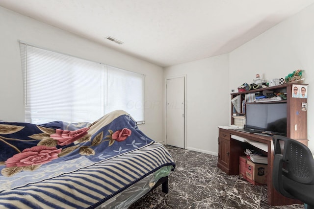 bedroom featuring visible vents