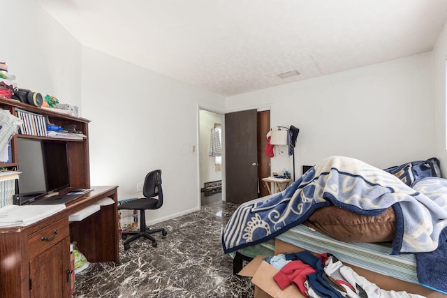 bedroom with marble finish floor, visible vents, and baseboards