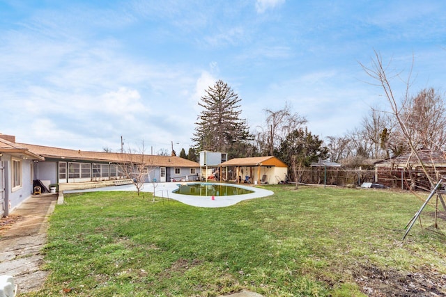 view of yard with a fenced in pool and a fenced backyard