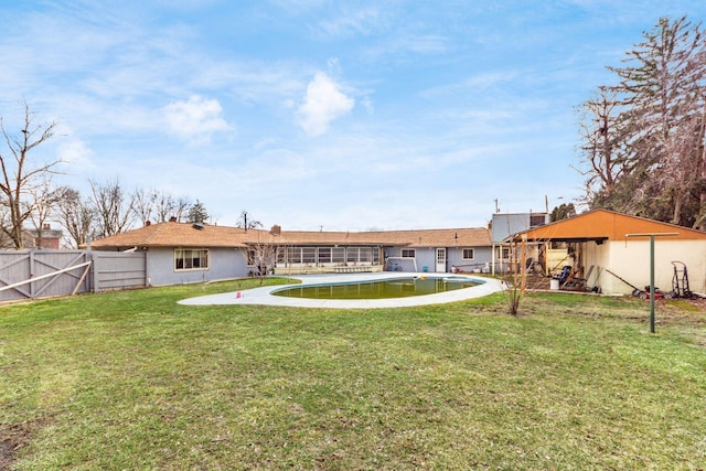 view of yard with a fenced backyard and a fenced in pool