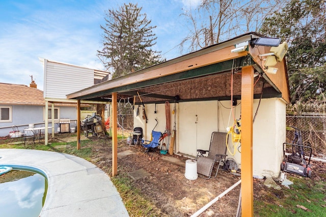 rear view of property with fence