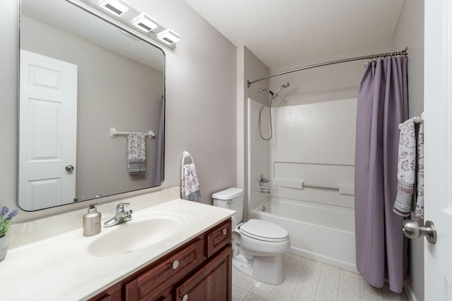 bathroom with toilet, vanity, tile patterned floors, a textured ceiling, and shower / bath combination with curtain