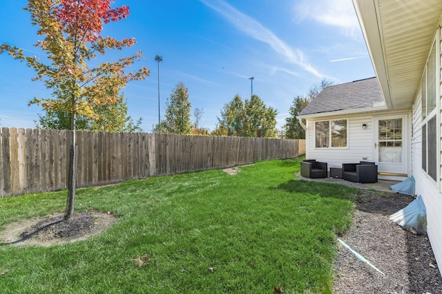 view of yard featuring a fenced backyard