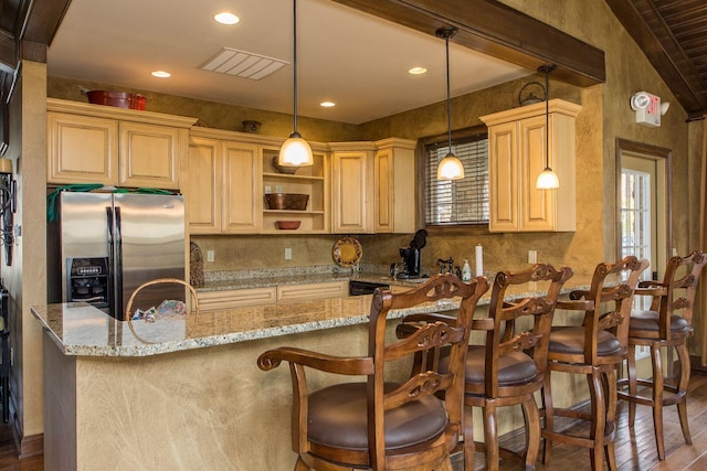 kitchen with light stone countertops, open shelves, dark wood-type flooring, stainless steel fridge, and tasteful backsplash