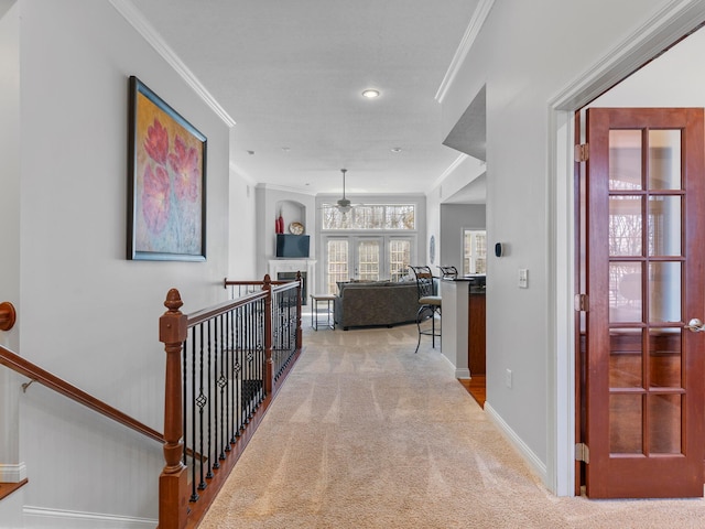 hallway with recessed lighting, baseboards, carpet flooring, and crown molding