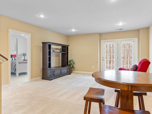 dining space with light carpet, visible vents, recessed lighting, and baseboards