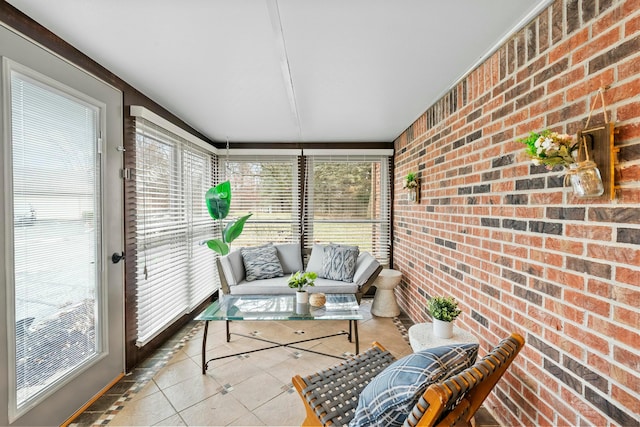 sunroom / solarium featuring a healthy amount of sunlight