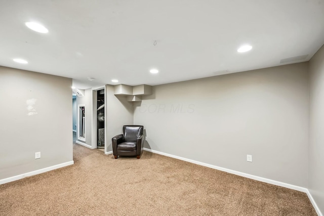 interior space featuring recessed lighting, carpet, and baseboards