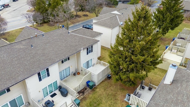 birds eye view of property with a residential view