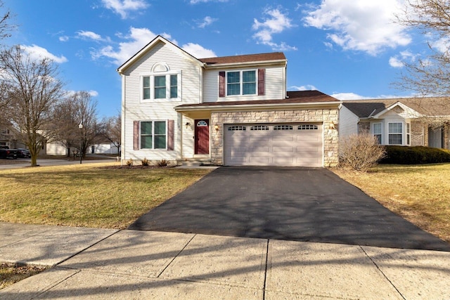 traditional-style home featuring driveway, stone siding, and a front lawn