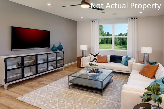 living area with baseboards, wood finished floors, a ceiling fan, and recessed lighting