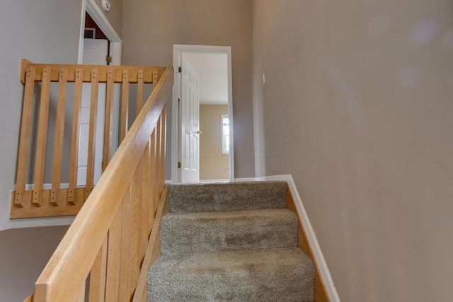 stairway with baseboards